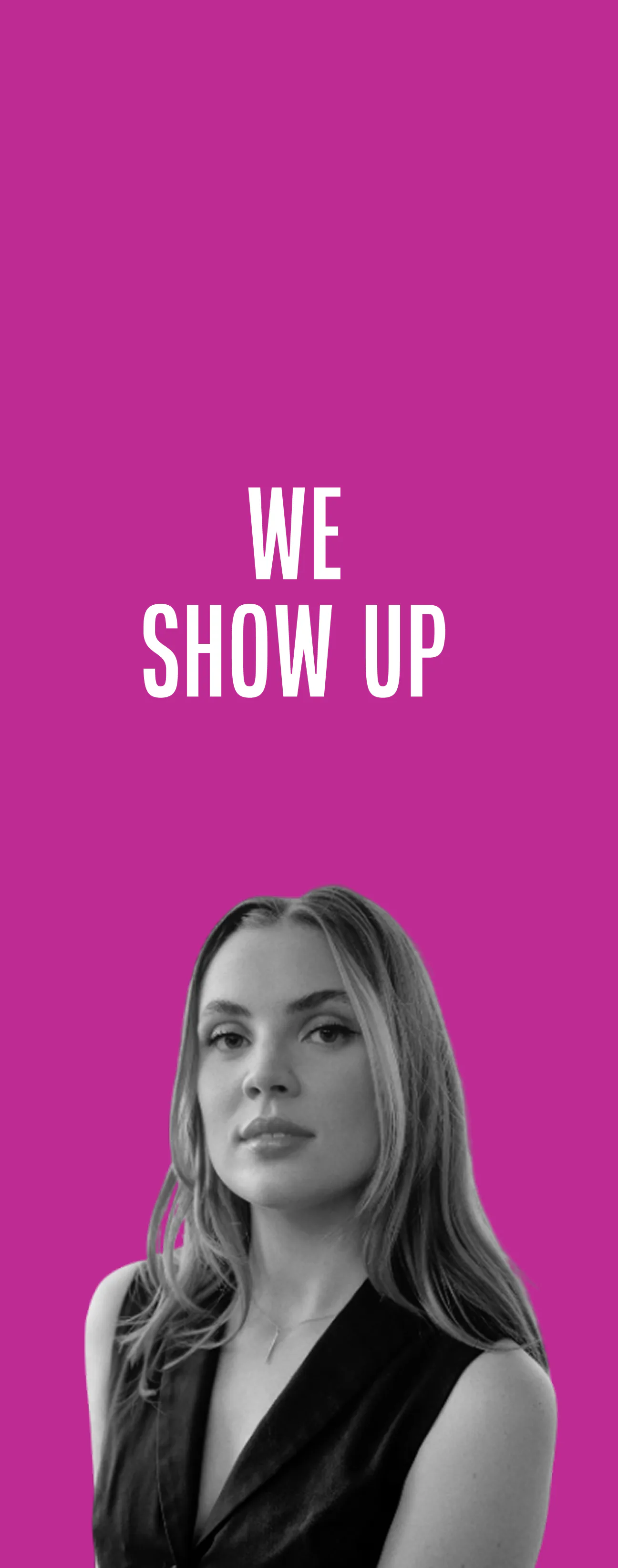 Black and white photo of a confident young woman with long hair and a sleeveless top, against a solid magenta background with the white text 'WE SHOW UP' above her head.